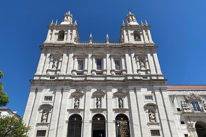 Private 1H30 Tuk Tuk Tour in Lisbon City - Lisbon Cathedral and the road into Alfama