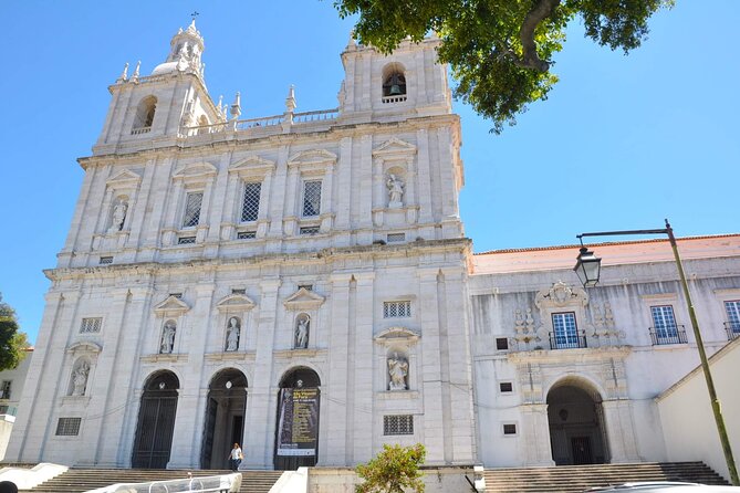 Private Eco Tuk Tuk Tour of Lisbon's Center Essential Landmarks - Reaching Lisbon’s highest neighborhood viewpoint