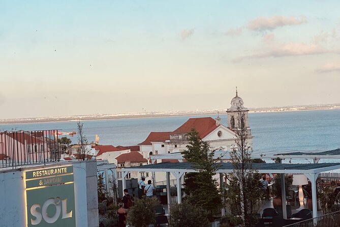 Private Eco Tuk Tuk Tour of Lisbon's Center Essential Landmarks - Looking across Alfama from Portas do Sol