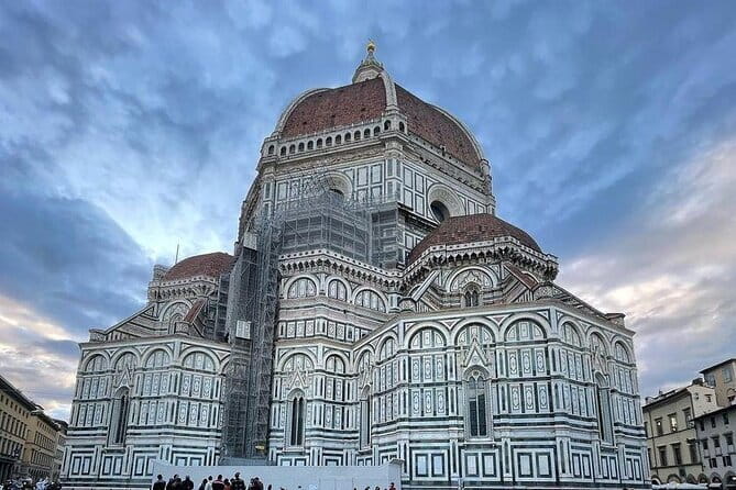 Private Florence Tour by Golf Cart ETukTuk with Audio Guide - Santa Maria Novella, the Arno, and the western center