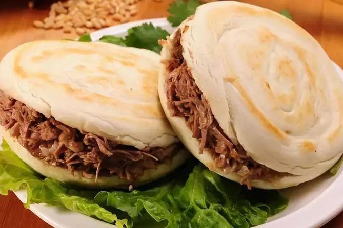 Private Xi'an Foodie Tour by Tuktuk - Dumplings, noodles, and pita bread-lamp soup