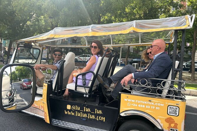 Privately Guided Panoramic Tour in Yellow Tuk Tuk from Madrid - The National Library, Prado, and Calle de Alcalá