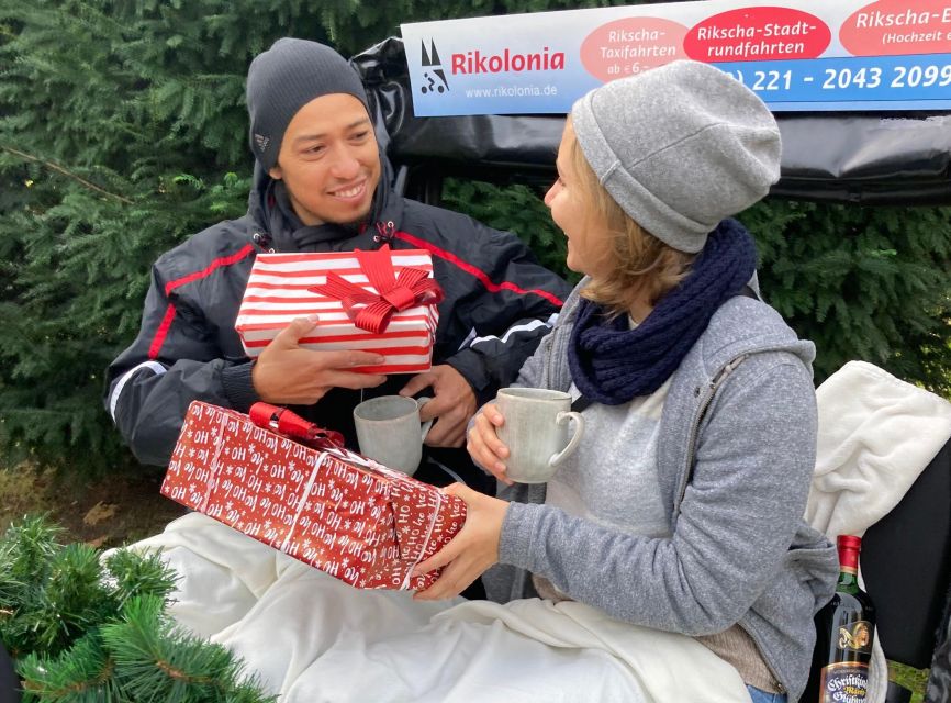 Rickshaw Glühwein Ride - Along the Rhine boulevard and river side