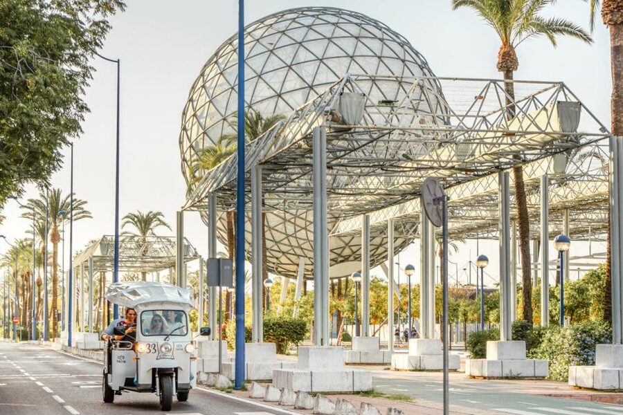 Seville: Private City Tour by Eco Tuk Tuk - San Telmo Palace and the old tobacco factory