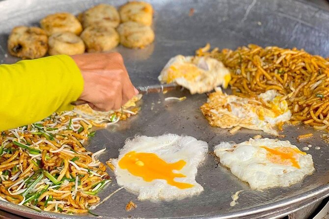 Siem Reap: Local Street Food Experience by Tuk-Tuk - The guide is the main reason to choose it