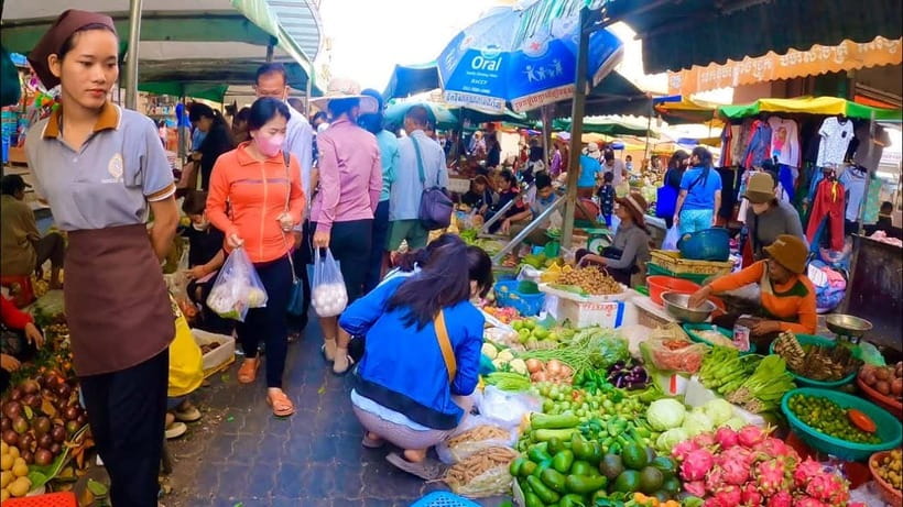 Siem Reap Street Foods Tour by Tuk Tuk with Personal Guide - Phsar Leu Thom Tmey after another tuk tuk ride
