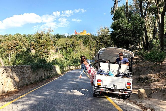 Sintra Electric Tuk Tuk Tour with Local Expert Guides 2h30 - Moorish Castle and Pena Palace from the park