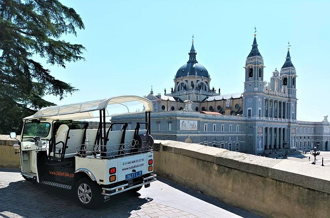 Tour of Castizo Madrid with a private guide in a yellow Tuk-Tuk - Puerta de Alcalá and the grand boulevards