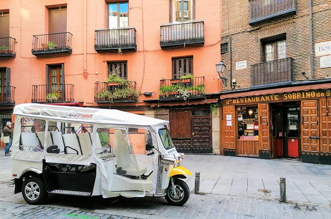 Tour of Castizo Madrid with a private guide in a yellow Tuk-Tuk - Mercado de San Miguel and Madrid’s food culture