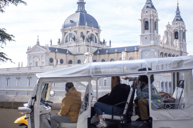 Tour of Historic and Modern Madrid with a guide in a yellow tuk tuk - Malasaña, Salamanca, and traditional Madrid