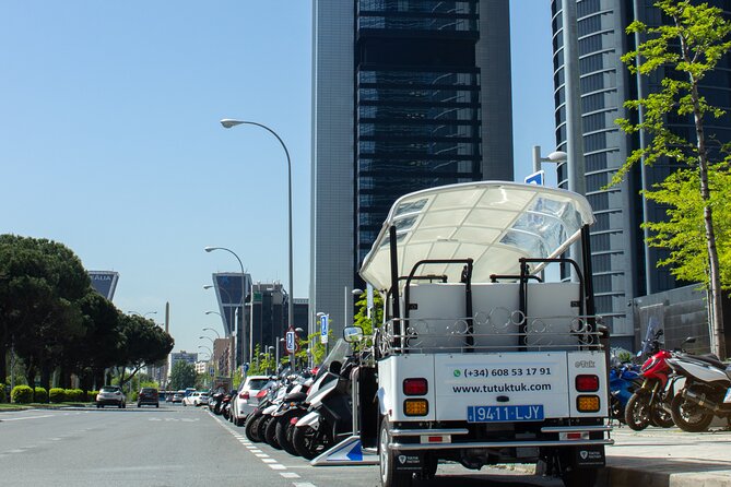 Tour of Historic and Modern Madrid with a guide in a yellow tuk tuk - Madrid Cathedral and the royal heart of the city