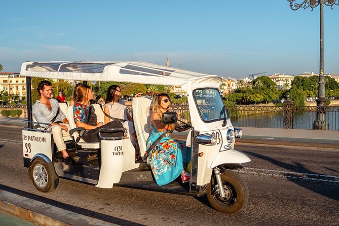 Tour Welcome Seville with Local Guide in Eco Tuk Tuk Private - Triana and the Isabel II Bridge