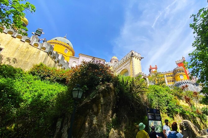 Tuk Tuk Tour Sintra Cascais – Palaces & Coastal Views - Passing through Cascais on the return