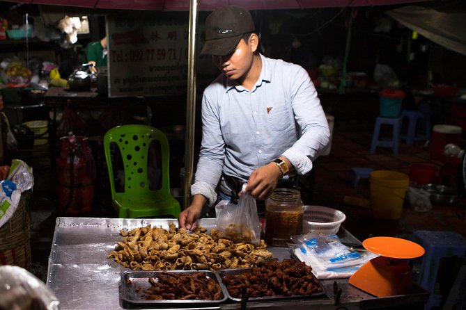 Ultimate Phnom Penh Food Tour by Tuk Tuk: 20 Tastings and Drinks - Russian Market after dark