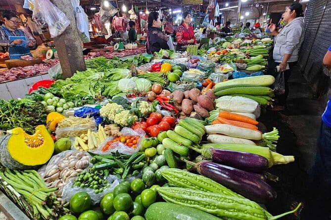 Ultimate Siem Reap Food Tour by Tuk Tuk - 20 Tastings, 8 Stops - Stop three: two classic Cambodian dishes
