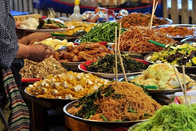 Vientiane Cuisine & Culture: The Hungry Tuk Tuk - The first market stop: choosing dinner in Lao style