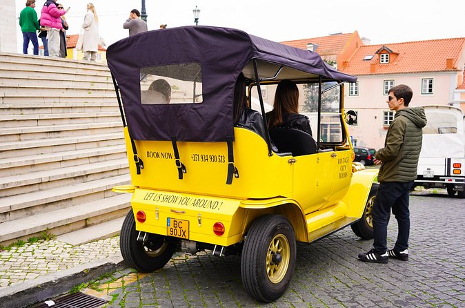 Vintage Tuk Tuk Tour experience in Alfama, Chiado, and Baixa 2h - Portas do Sol and the first view over Alfama