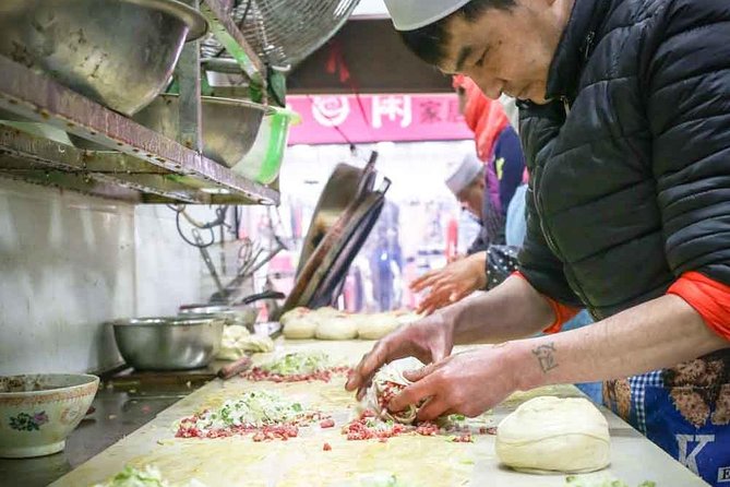 Xi'an Morning Food & Market Tour by TukTuk - Four or five stops, with breakfast instead of a single meal